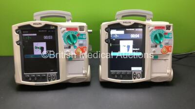 2 x Philips HeartStart MRx Defibrillators with 2 x Pacer, 2 x ECG and 2 x Printer Options with 1 x M3539A Module *Mfd 2012 - 2009* (Both Power Up)