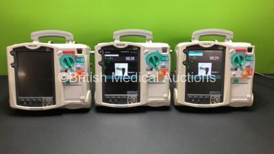 3 x Philips HeartStart MRx Defibrillators with 3 x Pacer, 3 x ECG and 3 x Printer Options *Mfd All 2009*(All Power Up with Stock Module - Not Supplied)