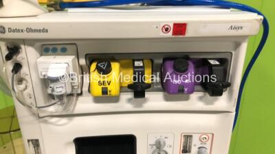 GE Datex Ohmeda Aisys Anaesthesia Machine *Software Version - 08.01* with Aladin2 Isoflurane Vaporizer, Aladin2 Sevoflurane Vaporizer, GE E-CAiOV Gas Module with Spirometry Option, Fresh Gas Module and Mini D-fend Water Trap *Mfd - 01/2009*, Philips Monit - 5