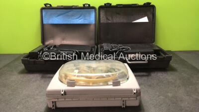 Mixed Lot Including 2 x Neuro Control Ref 1674 Power Supplies in Carry Cases (Both Power Up) 1 x Laerdal Suction Unit with 1 x DC Power Supply (Untested)