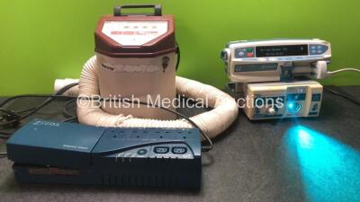 Mixed Lot Including 1 x Warm Air Hyperthermia System (Powers Up) 1 x Zigor Earo 650 Power Supply (No Power) 1 x Carefusion Alaris CC Syringe Pump (Powers Up with Fault) 1 x Ohmeda BiliBlanket Phototherapy Unit (Powers Up)