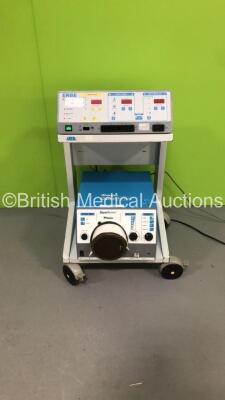 ERBE ICC 300 Electrosurgical Diathermy Unit (Draws Power, Shows Nothing on Screen) with Valleylab OptiMumm Smoke Evacuator (Powers Up) on ERBE Trolley