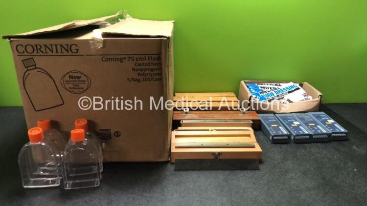 Mixed Lot Including Large Quantity Corning 75cm Flasks, 4 x Philips M3863A Batteries *All Untested* 5 x Water Jel Burn Dressing Pads and 7 x Sharps Block CORE Knifes