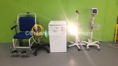 1 x Wheelchair, 1 x Regulator on Stand (Damaged), 1 x Daray Mobile Flex Patient Examination Lamp on Stand (Powers Up), 1 x Genix Fridge and 1 x Philips SureSIgns VSI Patient Monitor (Powers Up)