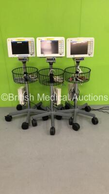 3 x Drager Infinity Delta Patient Monitors with HemoMed1, NIBP, Aux/Hemo3 and MultiMed Options, 4 x 5 Lead ECG Leads, 2 x SPO2 Finger Sensors, 1 x NIBP Hose, 3 x Docking Stations and 3 x Power Supplies on Stands (All Power Up, All Damaged Casing - See Pho
