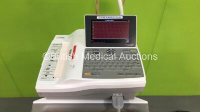 Burdick 8500 ECG Machine with 10 Lead ECG Lead (Powers Up) and GE F5-01 Module Rack *E8500-001519 / SEG12367764HX* - 2