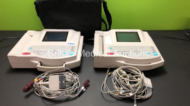 2 x GE MAC 1200 ST ECG Machines with 2 x Leads and 1 x Carry Bag (Both Draw Power with Blank Screens and 1 x Cracked Casing)