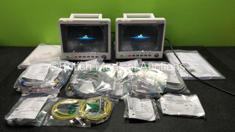 2 x EDAN iM60 Touch Screen Patient Monitors Including ECG, SpO2, NIBP, IBP1, IBP2, T1, T2 and CO2 Module Holder Options with 2 x Batteries, 2 x BP Hoses, 2 x BP Cuff, 2 x IBP Pressure Transducers, 2 x SpO2 Sensors, 2 x CO2 Sampling Lines, 2 x AC Power Cab