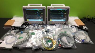 2 x EDAN iM60 Touch Screen Patient Monitors Including ECG, SpO2, NIBP, IBP1, IBP2, T1, T2 and CO2 Module Holder Options with 2 x Batteries, 2 x BP Hoses, 2 x BP Cuff, 2 x IBP Pressure Transducers, 2 x SpO2 Sensors, 2 x CO2 Sampling Lines, 2 x AC Power Cab