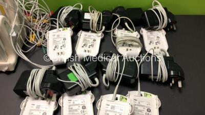 1 x Drager Infinity M300 Central Charger Unit (Powers Up) with 8 x Drager Infinity M300 Patient Telemetry Monitors, 8 x Drager MP03401 ECG Leads and 8 x Drager MS29558 Bedside Chargers - 3