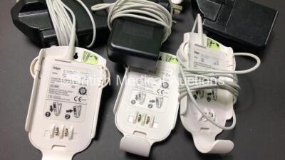 1 x Drager Infinity M300 Central Charger Unit (Powers Up) with 9 x Drager Infinity M300 Patient Telemetry Monitors, 12 x Drager MP03401 ECG Leads and 6 x Drager MS29558 Bedside Chargers - 5