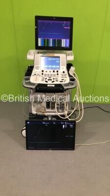 GE Vivid E9 Flat Screen Ultrasound Scanner Application Software Version 113 Revision 1.0 System Software Version 104.3.6 with 3 x Transducers/Probes (1 x 4V-D * Mfd June 2014 *,1 x M5Sc-D * Mfd Feb 2014 * and 1 x Pencil Probe) and ECG Lead (Powers Up with - 18