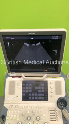 Toshiba Xario XG Flat Screen Ultrasound Scanner Model SSA-680A with 2 x Transducers/Probes (1 x PVT-375BT * Mfd Jan 2019 * and 1 x PLT-604AT * Mfd Jan 2013 *) (Powers Up-110V-Adapter Not Included-General Marks to Side Panels) * SN 99F1033876 * * Mfd March - 3