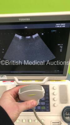 Toshiba Xario XG Flat Screen Ultrasound Scanner Model SSA-680A with 2 x Transducers/Probes (1 x PVT-375BT * Mfd Jan 2019 * and 1 x PLT-604AT * Mfd Jan 2013 *) (Powers Up-110V-Adapter Not Included-General Marks to Side Panels) * SN 99F1033876 * * Mfd March - 5