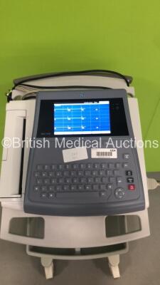 GE MAC 1600 ECG Machine on Stand with 1 x 10-Lead ECG Lead (Powers Up) * SN SDE11170062NA * * Mfd 2011 * - 3