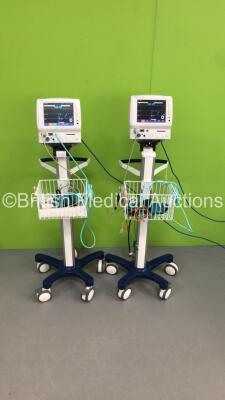 2 x Fukuda Denshi DS-7100 Patient Monitors on Stands with ECG/Resp,SpO2,NIBP,BP,Temp and Printer Options with 2 x BP Hoses,2 x BP Cuffs and 2 x ECG Leads (Both Power Up) * SN 50002662 / 50002676 *