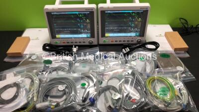 2 x EDAN iM60 Touch Screen Patient Monitors Including ECG, SpO2, NIBP, IBP1, IBP2, T1, T2 and CO2 Module Holder Options with 2 x Batteries, 2 x BP Hoses, 2 x BP Cuff, 2 x IBP Pressure Transducers, 2 x SpO2 Sensors, 2 x CO2 Sampling Lines, 2 x AC Power Cab