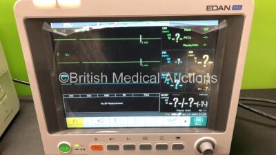 2 x EDAN iM60 Touch Screen Patient Monitors Including ECG, SpO2, NIBP, IBP1, IBP2, T1, T2 and CO2 Module Holder Options with 2 x Batteries, 2 x BP Hoses, 2 x BP Cuff, 2 x IBP Pressure Transducers, 2 x SpO2 Sensors, 2 x CO2 Sampling Lines, 2 x AC Power Cab - 2