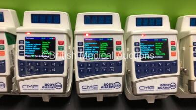 8 x CME Bodyguard 323 Infusion Pumps and 10 x Charger-Docking Stations (All Power Up) - 3