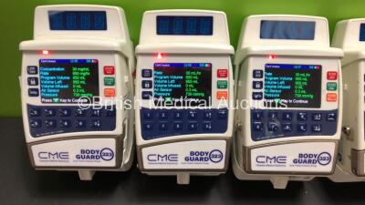 8 x CME Bodyguard 323 Infusion Pumps and 10 x Charger-Docking Stations (All Power Up) - 4