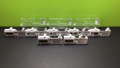 7 x McKinley CME T34 Syringe Pumps Ref 400-339S with 3 x Cases (All Power Up with 1 x Faulty Display - See Photo)