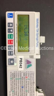 7 x McKinley CME T34 Syringe Pumps Ref 400-339S with 3 x Cases (All Power Up with 1 x Faulty Display - See Photo) - 5