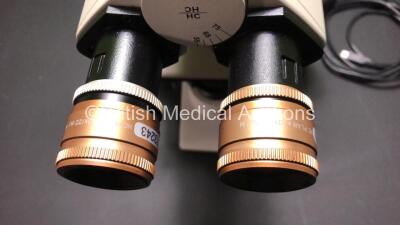 Leica DM2500 Bench Binocular Microscope (Powers Up) with 2 x HC PLAN s 10x 22 Eyepieces, 5 x Optics Including 1 x HCX PL FLUOTAR 100x 1.30 OIL, 1 x 40x 0.75, 1 x 10x 0.30, 1 x 5x 0.15, 20x 0.50, 1 x 1.25x 0.04 and 1 x Leica DFC420 Digital Camera - 3