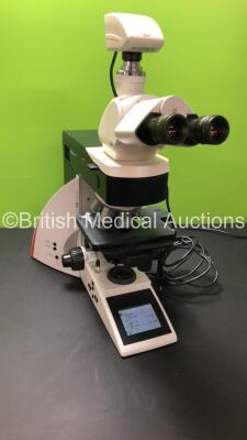 Leica DM4000 B Bench Binocular Microscope (Powers Up) with 2 x HC PLAN s 10x 22 M Eyepieces, 7 x Leica Optics Including 1 x HCX PL FLUOTAR 1.25x 0.04, 1 x 40x 0.75, 1 x 5x 0.15, 1 x HC PL APO 10x 0.40, N PLAN 63x 0.80, HC PLAN APO 20x 0.70, 1 x PL FLUOTAR