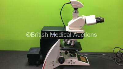 Leica DM4000 B Bench Binocular Microscope (Powers Up) with 2 x HC PLAN s 10x 22 M Eyepieces, 7 x Leica Optics Including 1 x HCX PL FLUOTAR 1.25x 0.04, 1 x 40x 0.75, 1 x 5x 0.15, 1 x HC PL APO 10x 0.40, N PLAN 63x 0.80, HC PLAN APO 20x 0.70, 1 x PL FLUOTAR - 3