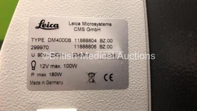 Leica DM4000 B Bench Binocular Microscope (Powers Up) with 2 x HC PLAN s 10x 25 M Eyepieces, 7 x Leica Optics Including 1 x HCX PL FLUOTAR 1.25x 0.04, 1 x 2.5x 0.07, 1 x 5x 0.15, 1 x HC PL APO 10x 0.40, N PLAN 63x 0.80, HC PLAN APO 20x 0.70, 1 x HCX PL AP - 11