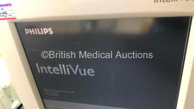Philips IntelliVue M8002A MP30 Touch Screen Patient Monitor Software Revision F.01.43 *Mfd 2008(Powers Up with Some Scratches to Screen - See Photo) with 1 x Philips M3001A Module Including ECG, SpO2, NBP, Temp and Press Options *Mfd 2009-07* and 1 x M3 - 2