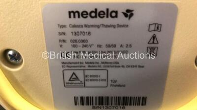 Mixed Lot Including 2 x Bardscan II Bladder Scanners with 2 x Power Supplies, 1 x Probe and 4 x Batteries (Both Power Up with 1 x Blank Screen and 1 x Missing Lid) and 1 x Medela Calesca Warming Device - 6