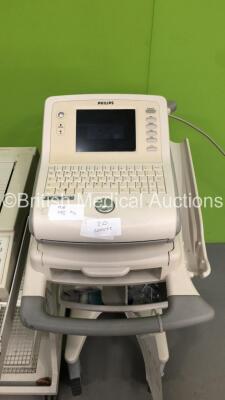 1 x Philips Page Writer Trim II ECG Machine (Powers Up) and 1 x Hewlett Packard Pagewriter 200i ECG Machine on Stand (Draws Power - Blank Screen) - 2