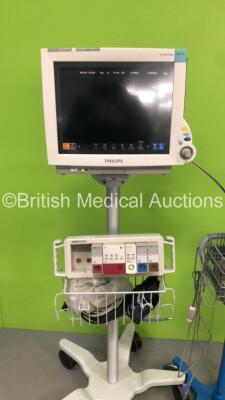 1 x Philips IntelliVue MP70 Patient Monitor on Stand * Mfd 2011 * and 1 x GE Pro 400V2 Patient Monitor on Stand with 1 x SpO2 Finger Sensor and 1 x BP Hose (Both Power Up) - 2