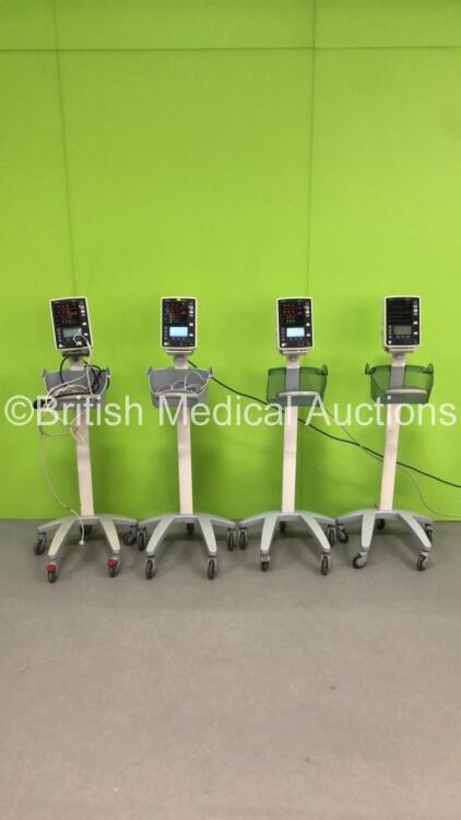 4 x Mindray Datascope Accutorr V Vital Signs Monitor on Stands (All Power Up - All Damaged - 1 x Missing Cover - 1 x Not Attached to Stand Due to Broken Clip) *S/N A7522787C3 / A7514854l1 / A7618980G2 / A7508527L0*