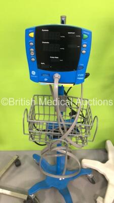 Mixed Lot Including 1 x Philips SureSigns VM4 Patient Monitor on Stand with 1 x SpO2 Finger Sensor and 1 x BP Cuff,1 x GE Carescape V100 Patient Monitor on Stand with 1 x BP Hose,1 x Speidel & Keller BP Meter on Stand and 1 x Luxo Patient Examination Ligh - 3