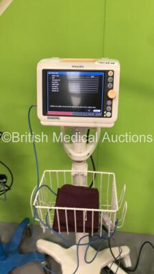 Mixed Lot Including 1 x Philips SureSigns VM4 Patient Monitor on Stand with 1 x SpO2 Finger Sensor and 1 x BP Cuff,1 x GE Carescape V100 Patient Monitor on Stand with 1 x BP Hose,1 x Speidel & Keller BP Meter on Stand and 1 x Luxo Patient Examination Ligh - 4