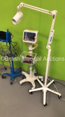 Mixed Lot Including 1 x Philips SureSigns VM4 Patient Monitor on Stand with 1 x SpO2 Finger Sensor and 1 x BP Cuff,1 x GE Carescape V100 Patient Monitor on Stand with 1 x BP Hose,1 x Speidel & Keller BP Meter on Stand and 1 x Luxo Patient Examination Ligh - 5