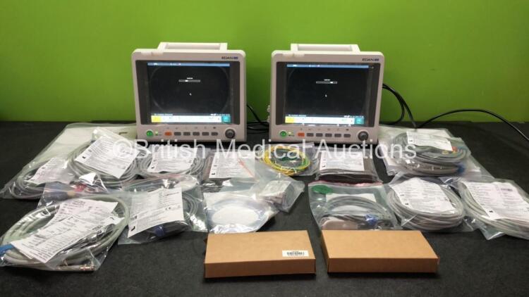 2 x EDAN iM60 Touch Screen Patient Monitors Including ECG, SpO2, NIBP, IBP1, IBP2, T1, T2 and CO2 Module Holder Options with 2 x Batteries, 2 x BP Hoses, 2 x BP Cuff, 2 x IBP Pressure Transducers, 2 x SpO2 Sensors, 2 x CO2 Sampling Lines, 2 x AC Power Ca