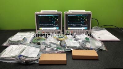 2 x EDAN iM60 Touch Screen Patient Monitors Including ECG, SpO2, NIBP, IBP1, IBP2, T1, T2 and CO2 Module Holder Options with 2 x Batteries, 2 x BP Hoses, 2 x BP Cuff, 2 x IBP Pressure Transducers, 2 x SpO2 Sensors, 2 x CO2 Sampling Lines, 2 x AC Power Ca
