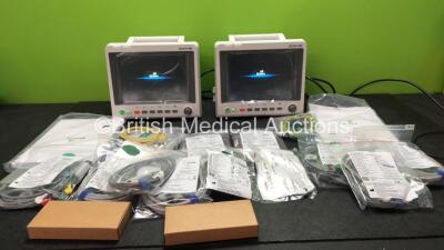 2 x EDAN iM60 Touch Screen Patient Monitors Including ECG, SpO2, NIBP, IBP1, IBP2, T1, T2 and CO2 Module Holder Options with 2 x Batteries, 2 x BP Hoses, 2 x BP Cuff, 2 x IBP Pressure Transducers, 2 x SpO2 Sensors, 2 x CO2 Sampling Lines, 2 x AC Power Ca