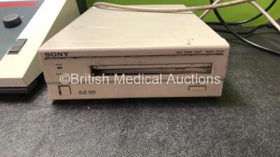 Mixed Lot Including 1 x Welch Allyn CP 200 ECG Machine (No Power) 1 x Enraf Nonius Myomed 932 Biofeedback Electrotherapy Machine (Untested Due to Missing Power Supply) 1 x Sony RMO-S551 MO Disk Unit (Powers Up with Damage-See Photo) - 4