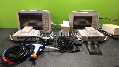 Mixed Lot Including 2 x Drager Infinity Delta Patient Monitors with 2 x AC Power Supplies (Both Power Up with Damage-See Photo) 2 x Drager Infinity Docking Stations, 1 x Spembly Medical Cryo Gun, 1 x Inspired Energy Smart Battery Charger