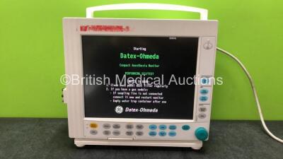 Datex Ohmeda Type F-CM1-04 Compact Anesthesia Monitor with 1 x GE E-CAiO Module and 1 x GE E-PRESTN Module Including ECG, SpO2, T1, T2, P1,P2 and NIBP Options (Powers Up) *SN 6342016, 6350019, 6344801*
