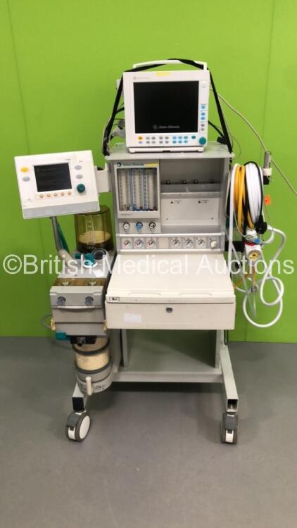 Datex-Ohmeda Aestiva/5 Anaesthesia Machine with Datex-Ohmeda 7100 Ventilator Software Version 1.3 with Datex-Ohmeda Compact Anaesthesia Monitor with E-PRESTN Multiparameter Module and E-CAiO Gas Module , Bellows, Absorber and Hoses (Powers Up)