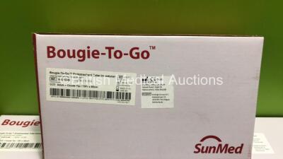 Mixed Lot Including 2 x Mobile Cylinder Holders, 1 x Crutch, 3 x Support Cushions, 5 x Ambu Resuscitators, 13 x Tracheal Intubations Stylets and Approximately 100 x SunMed Bougie-To-Go Endotracheal Tube Introducers - 3