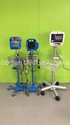 1 x Mindray PM-7000 Patient Monitor on Stand (Missing Light Cover - Missing 1 x Wheel on Stand - See Pictures), 1 x Dinamap Pro 400 Vital Signs Monitor on Stand and 1 x Dinamap ProCare Auscultatory 400 Vital Signs Monitor on Stand (All Power Up) *S/N 2019