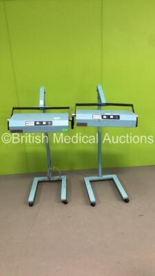 2 x Olympic Bili-Lite Therapy Lights on Stands (Both Not Power Tested Due to 110v -1 x Damaged Fascia-See Pictures)