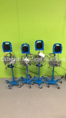 4 x GE ProCare Patient Monitors on Stands with 4 x BP Cuffs,3 x BP Hoses and 4 x SpO2 Finger Sensors (All Power Up)