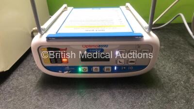 Mixed Lot Including 1 x Welch Allyn Spot Vital Signs Patient Monitor with 1 x Hose (Powers Up when Tested with Stock Power Supply-Power Supply Not Included) 1 x Medi Rent BV Centrifuge (Powers Up) 1 x Optima 8590 Carital Mattress Pump (Powers Up) *SN 2120 - 5